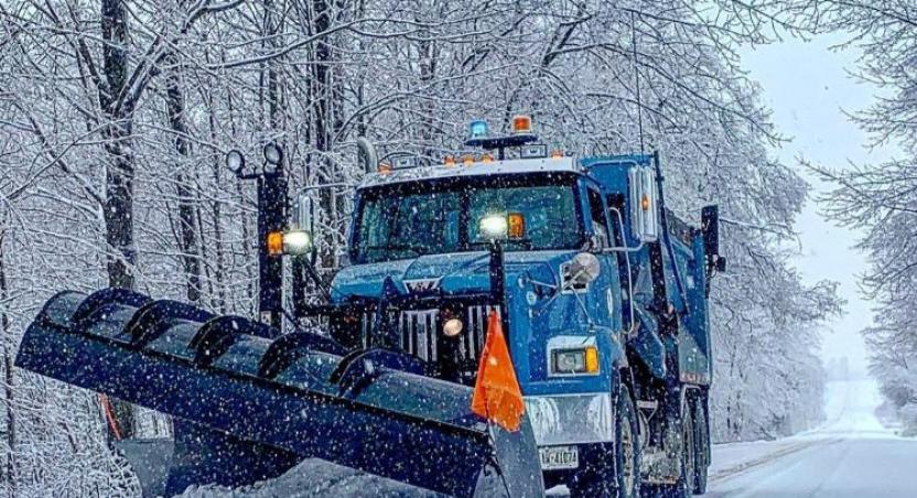 Snowplow on rural road