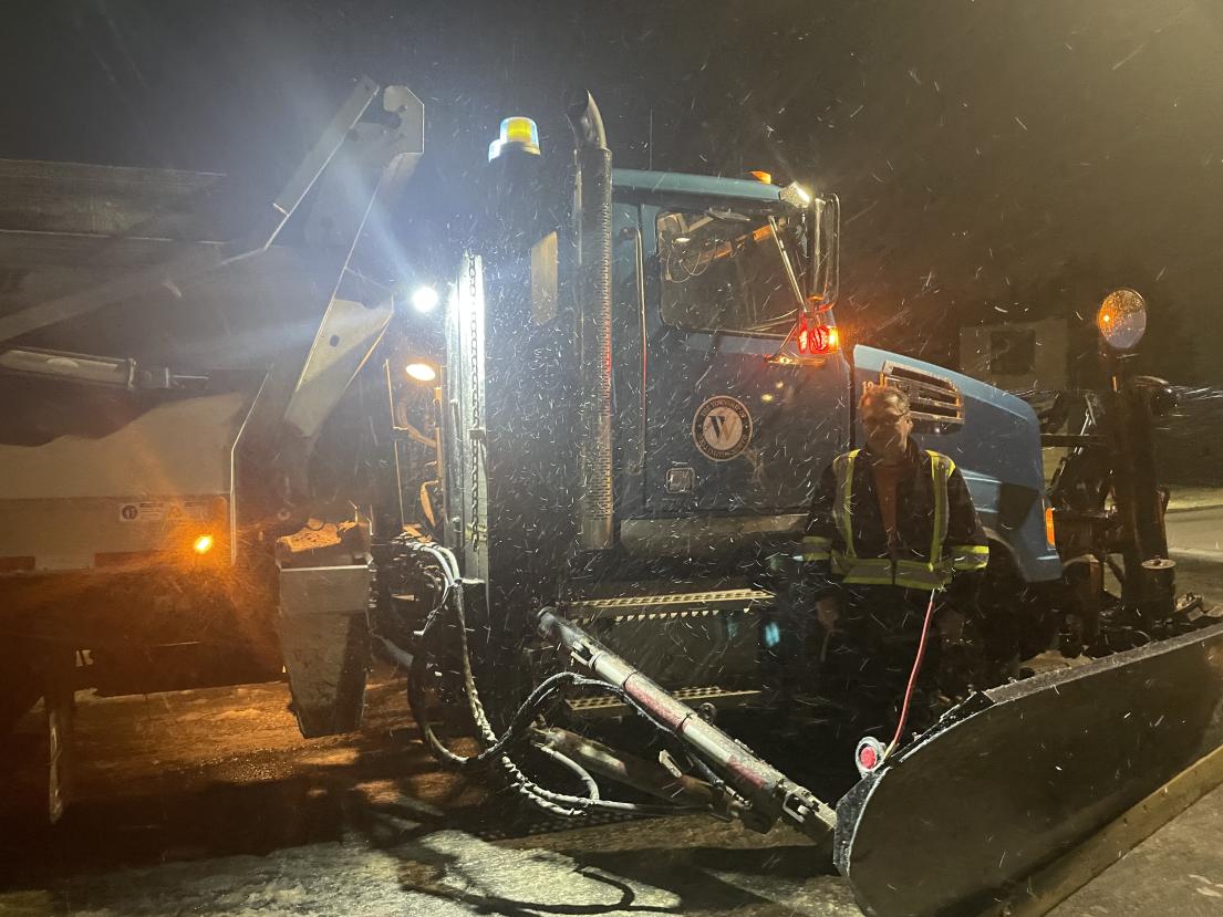 Snowplow with municipal employee